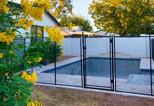Florida Pool Fences - Should I Consider a Manual Entry Opening for My Pool Safety Fence?