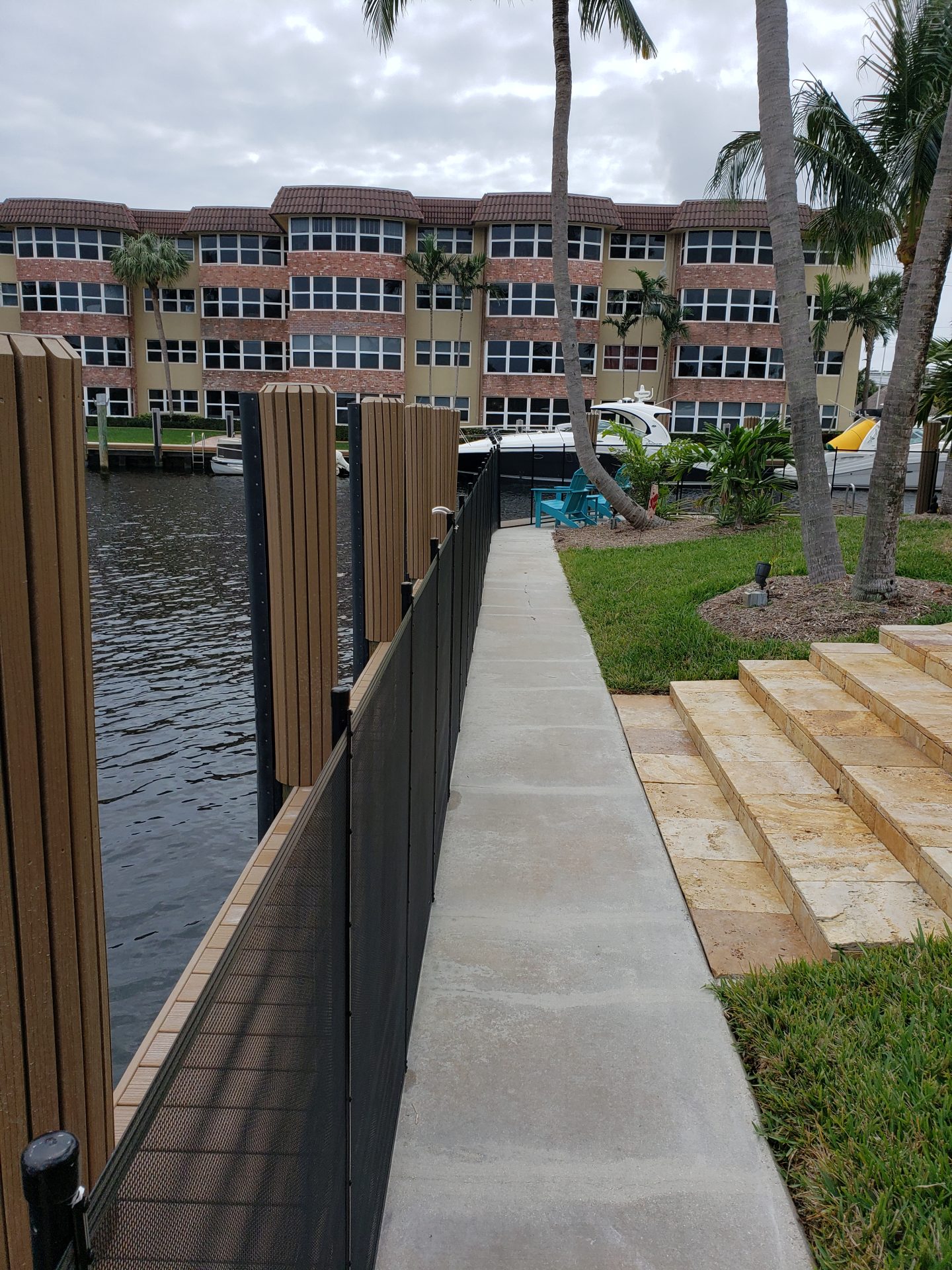 Pool fence cost in South Florida for a waterfront removable mesh fence route
